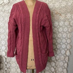 Super cute deep coral colored shrug sweater